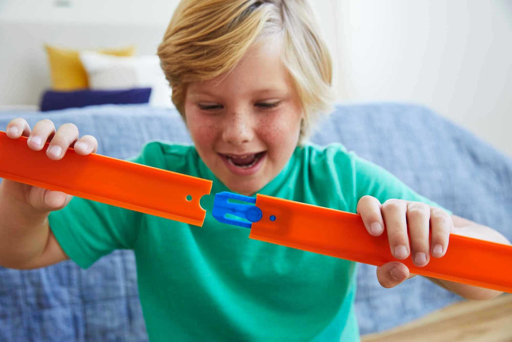 Hot Wheels track builder connectors enable seamless track extensions.