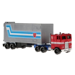 Optimus Prime robot figure on track, showcasing authentic Transformers detailing.