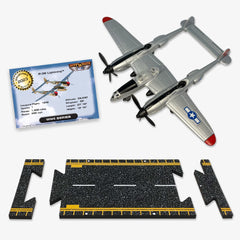 Hot Wings Planes P-38 Lightning die-cast plane in grey for display.