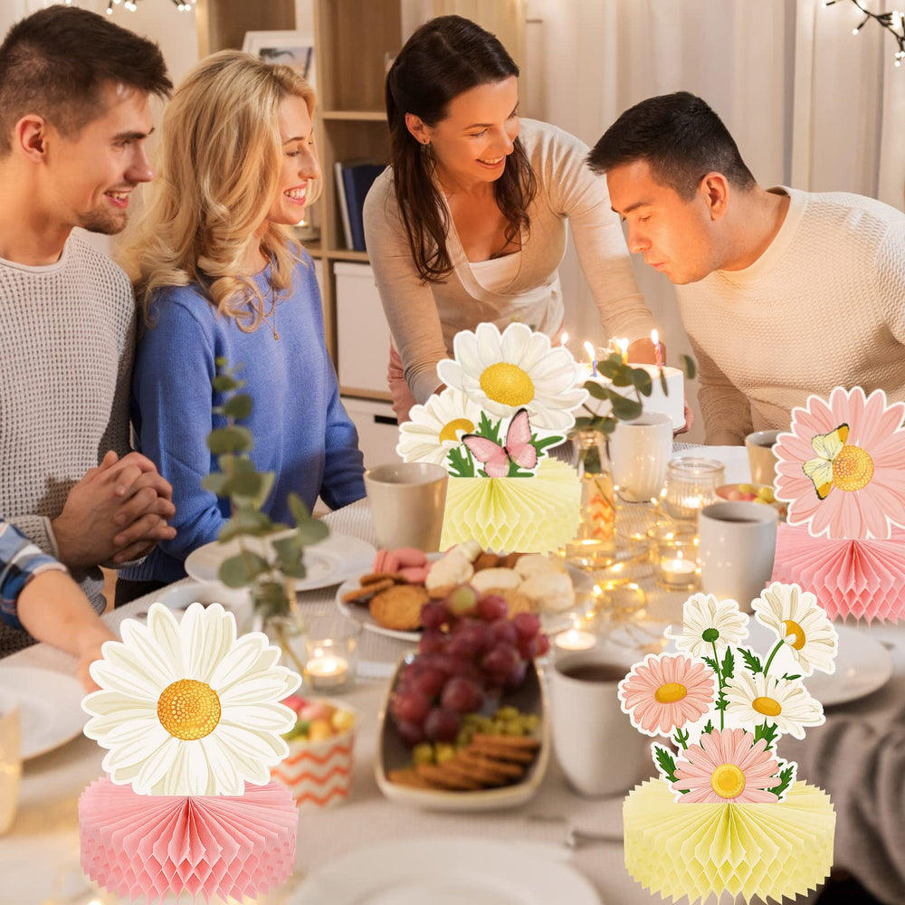 Hotop baby shower daisy centerpiece adds soft pink charm.