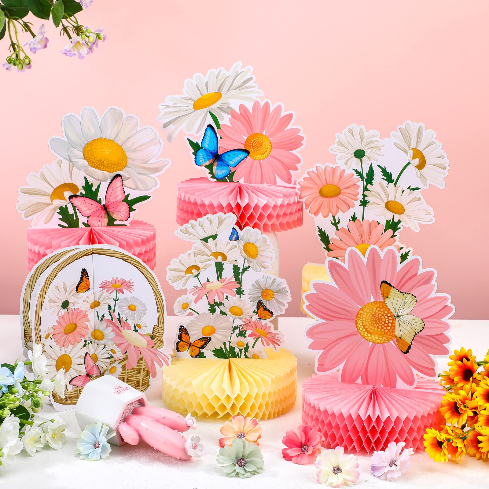 Hotop pink patterns daisy centerpiece creates a playful focal point.