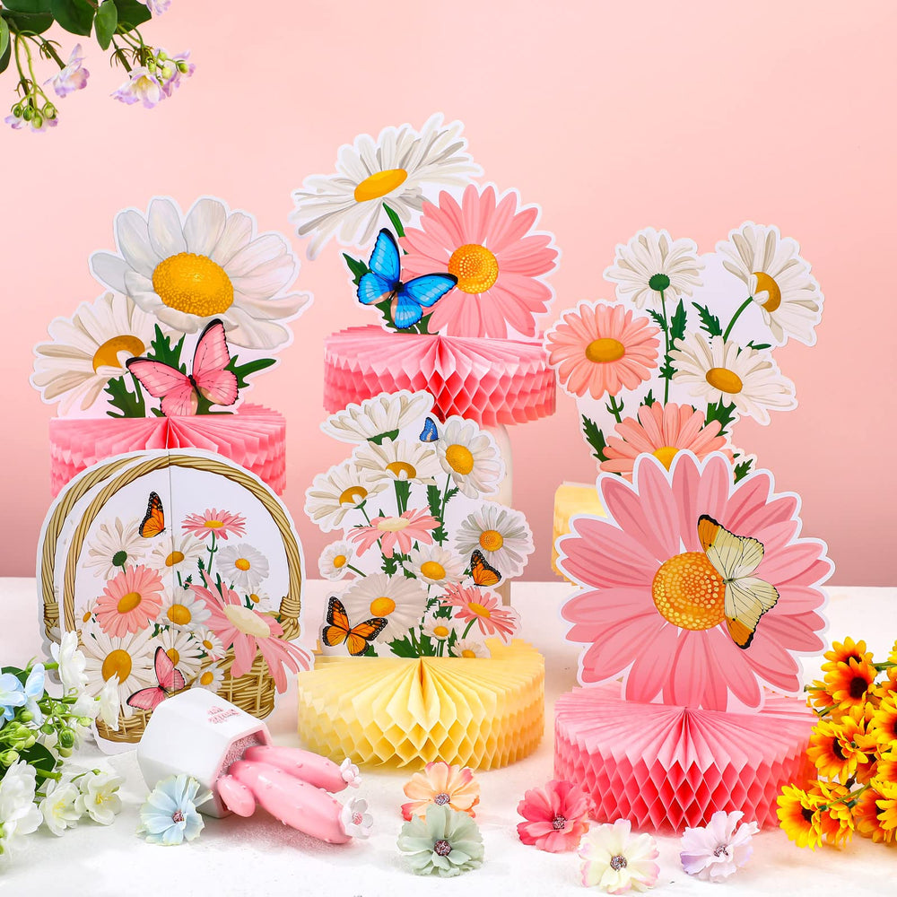 Hotop pink patterns daisy centerpiece creates a playful focal point.