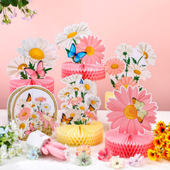 Hotop pink patterns daisy centerpiece creates a playful focal point.