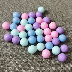 Hotusi replacement marbles ready to swap during fast rounds.