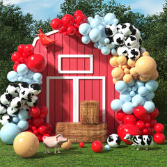 House of Party cow balloon garland with blue red tan balloons for a playful farm party.