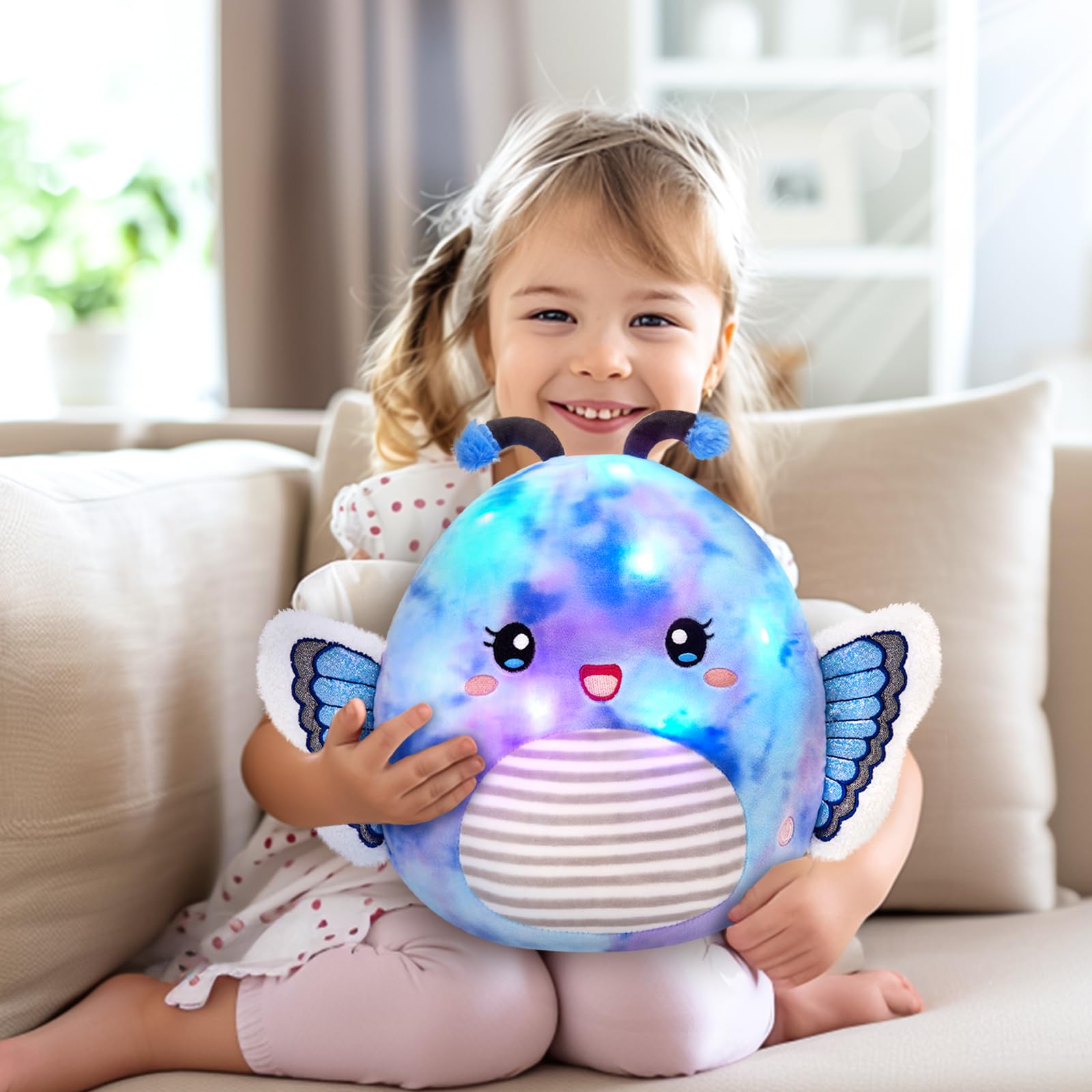 Houwsbaby decorative butterfly pillow on a sofa adds whimsical charm.