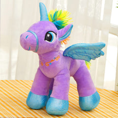 Houwsbaby glitter wings unicorn plush highlights sparkling wings during cuddles.