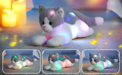 Houwsbaby plush cat held by child, promoting cozy playtime and imagination.