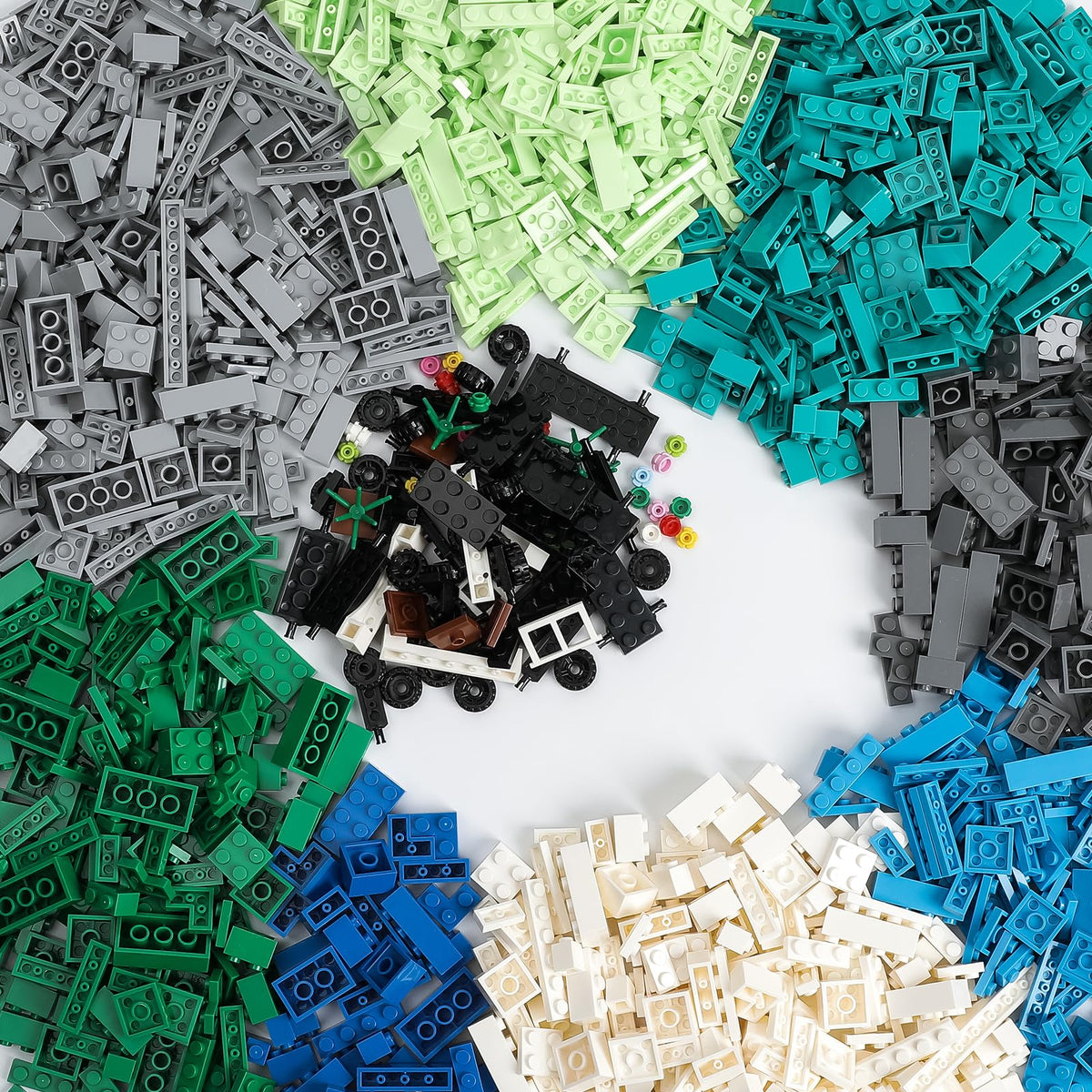 HUIZDQ 1800Pcs bricks in blue, green and white for colorful building play.