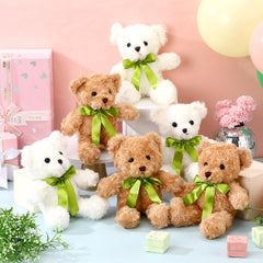 Hungdao plush bear with green bow detail enhances gift presentation.