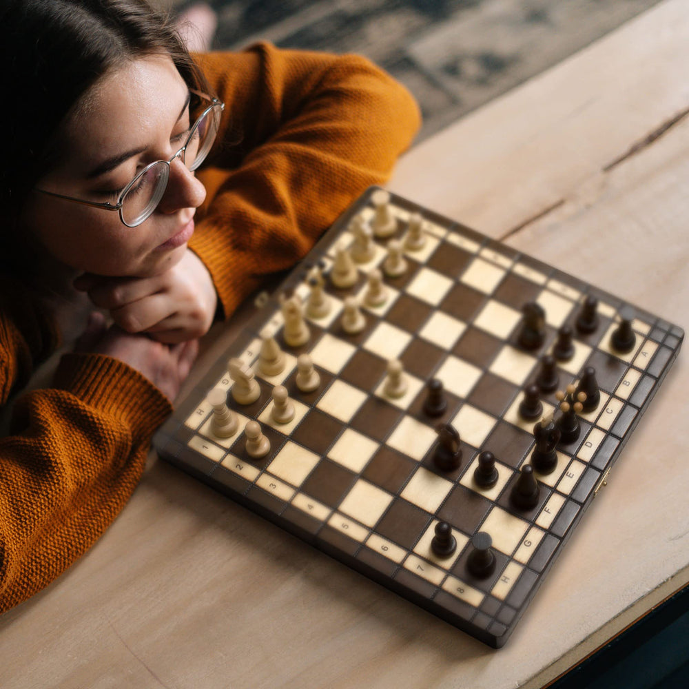 Husaria board includes decorative metal clasps to lock after play