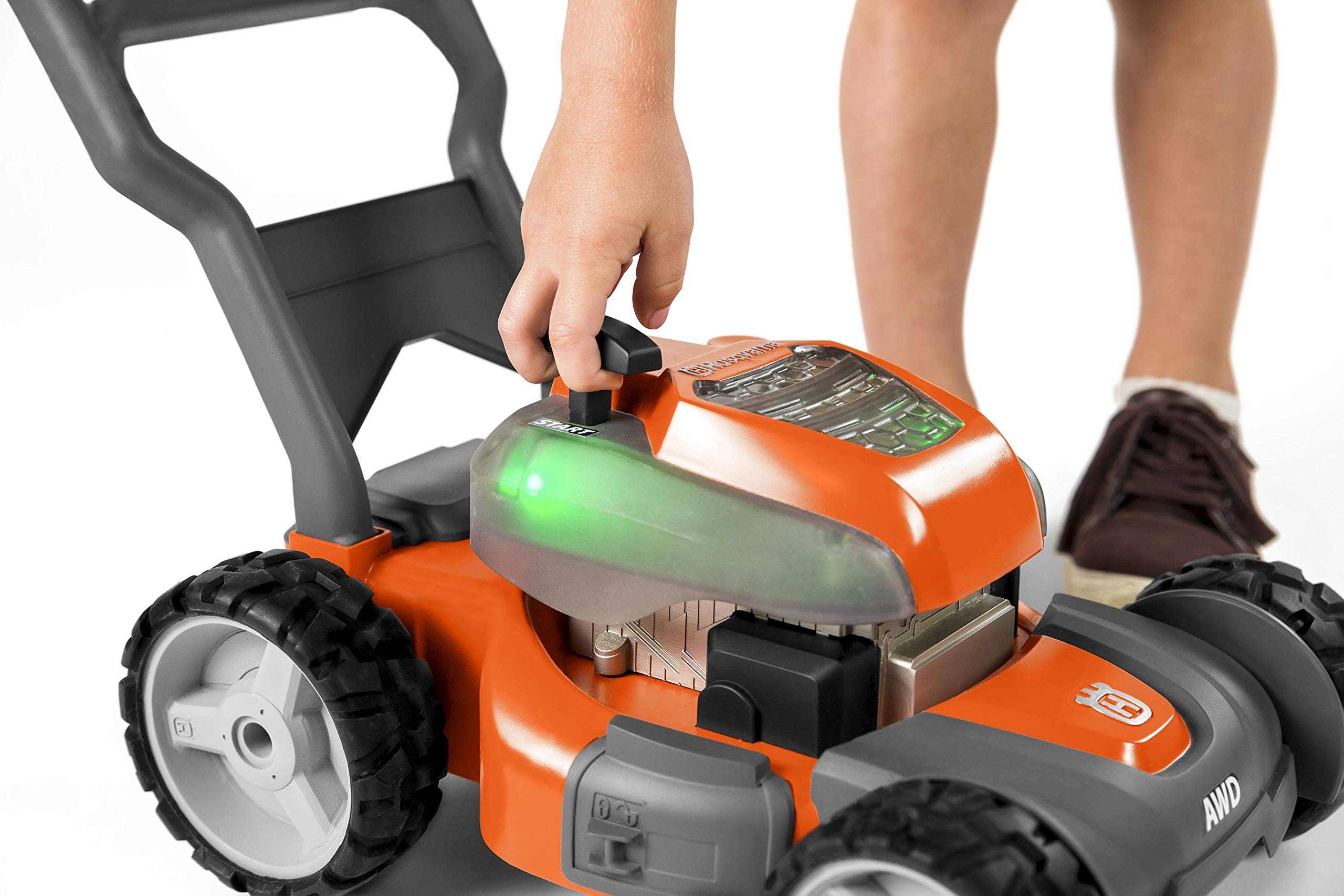 Husqvarna toy lawn mower simple controls for easy on/off operation.
