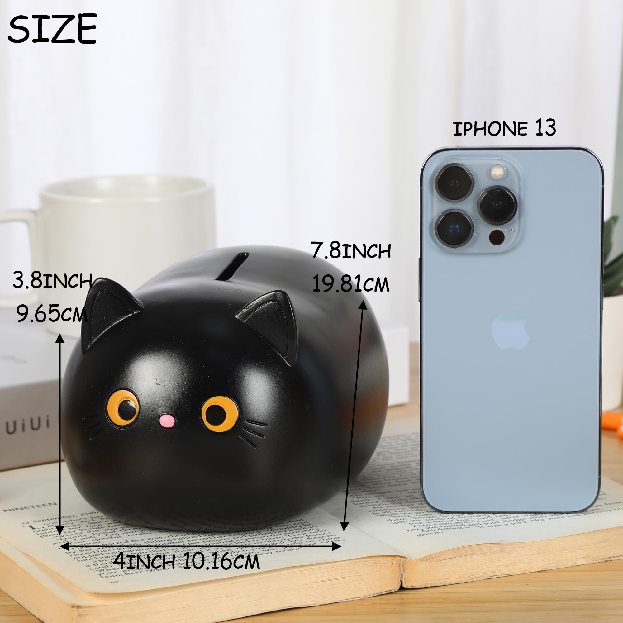 H&W Black Cat Piggy Bank crafted from durable plastic blending playful decor with function.