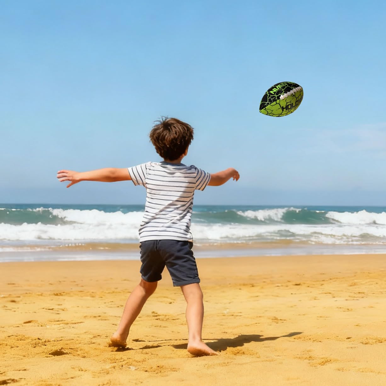 HW HOLOWIN water football on a sunny beach day.