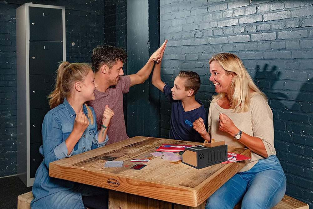 Identity Games Escape Room Family Edition Tabletop play fosters family bonding.
