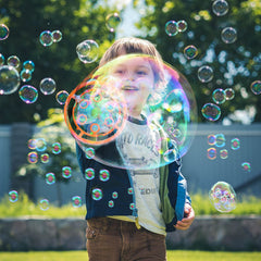 IFLOVE bubble gun dino green bubbles filling air for kids' joy