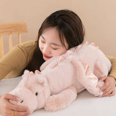 IFX24 pink dragon plush close-up fabric highlighting soft texture