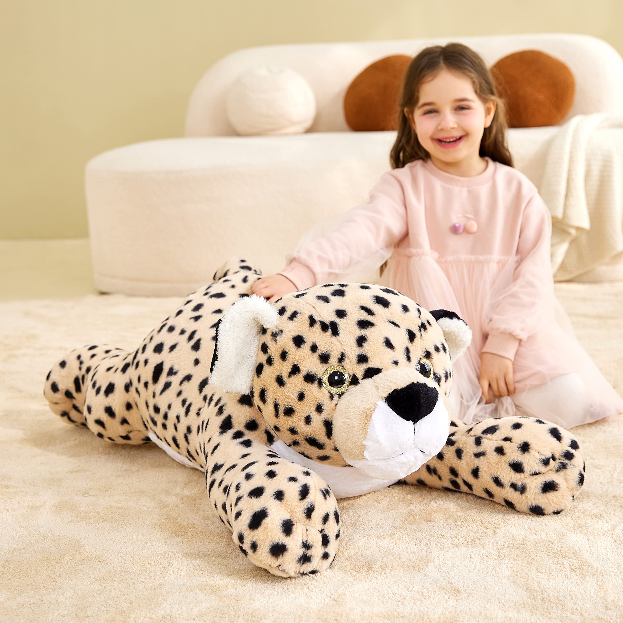 IKASA cheetah plush bedside scene demonstrates cozy bedtime companion.