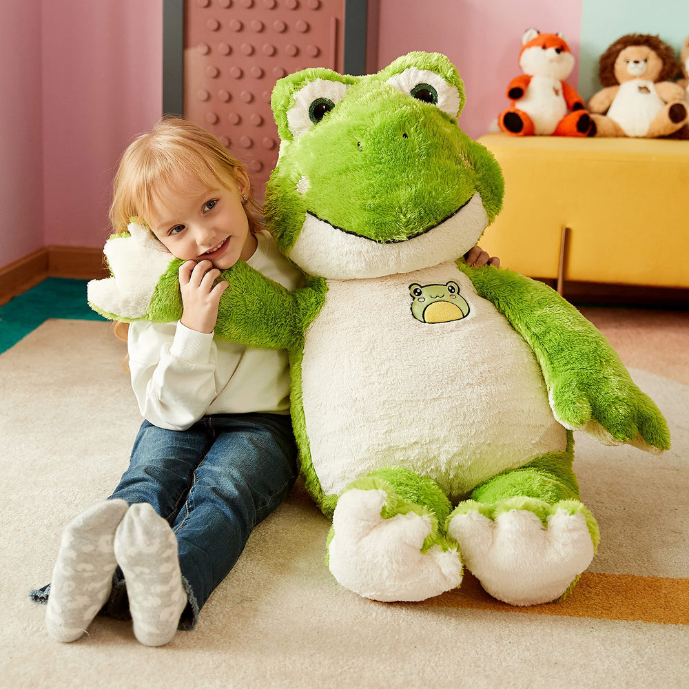 IKASA giant frog plush in a kids' room as playful decor element.
