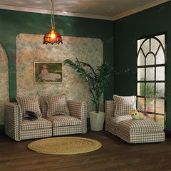 Close-up of iLAND couch in houndstooth fabric showing tactile texture.