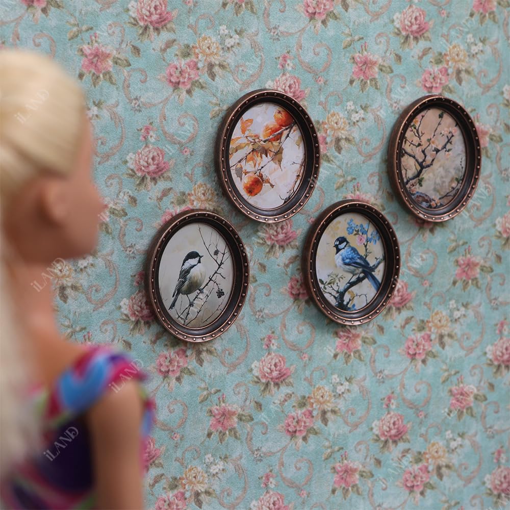 iland mini art set elevates small interiors with curated art in metal oval frames.