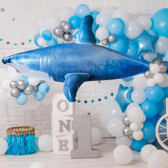 ILEISURELY shark pool toy folded for compact storage and reuse.
