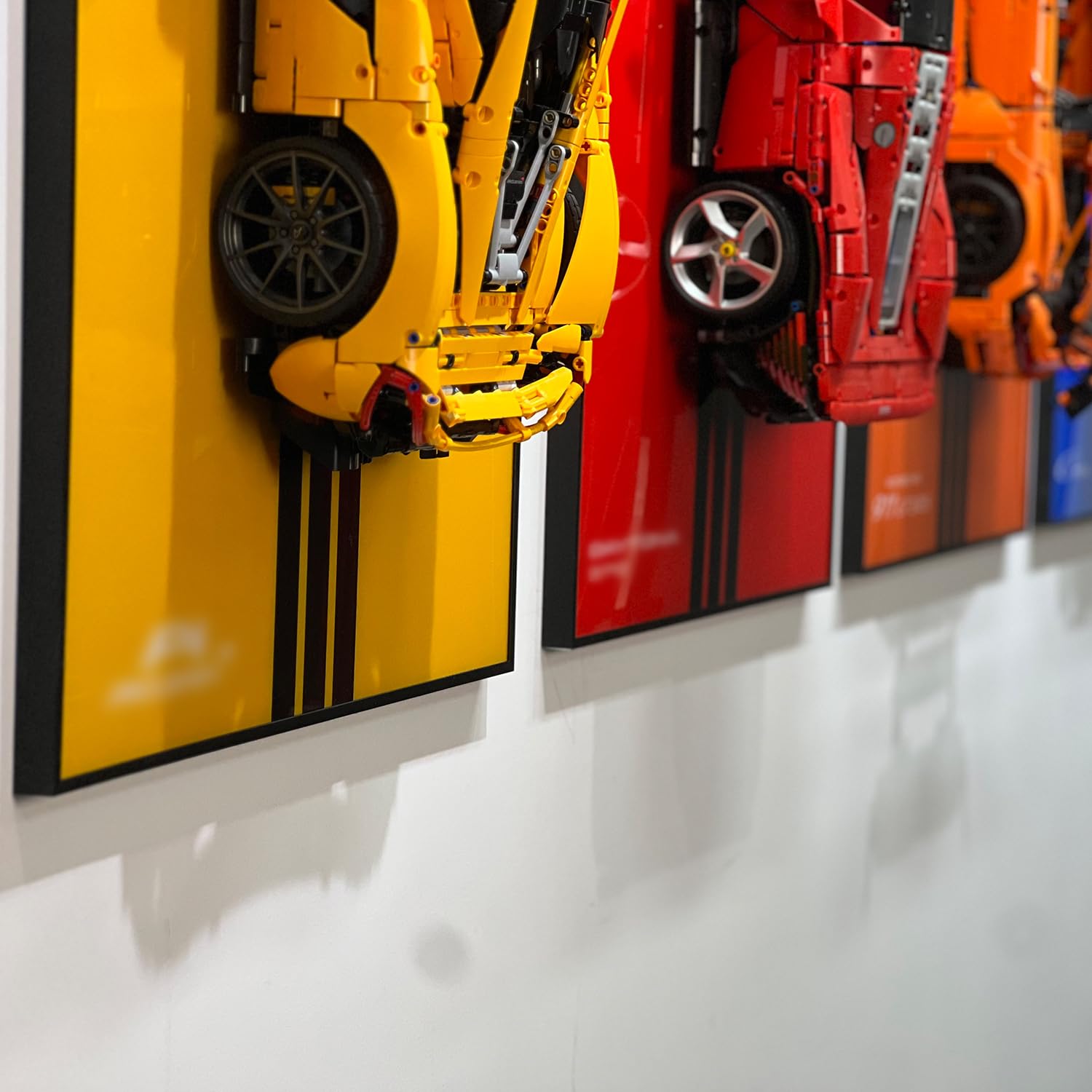 iLuane Display Wallboard aluminum frame and acrylic mirror enhance collectible presentation.