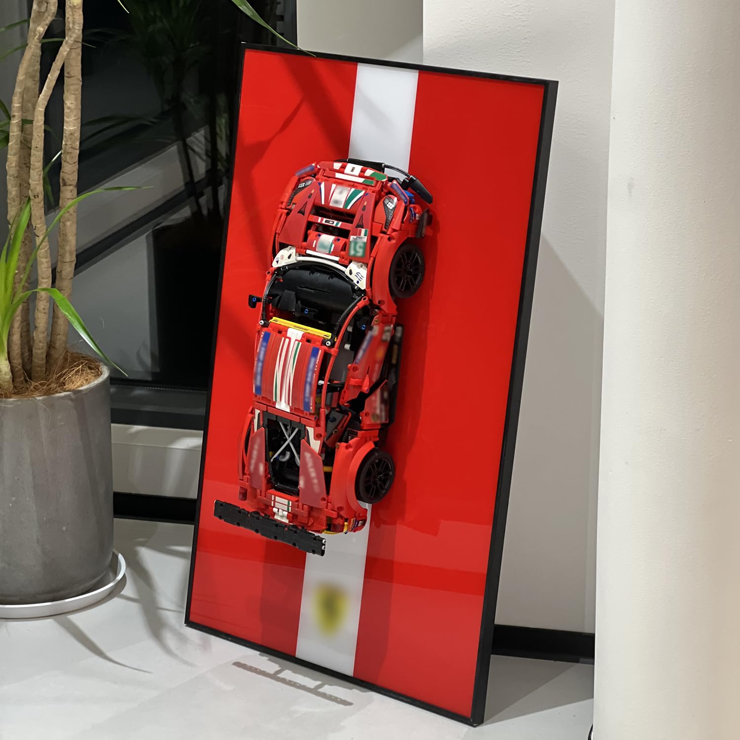 iLuane Display Wallboard showcasing race car collection as elegant wall art
