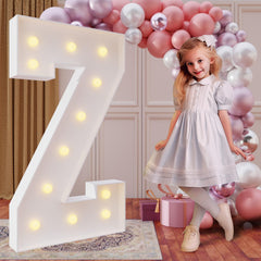 imprsv 4ft marquee letter Z assembly creates a bold photo backdrop for celebrations.