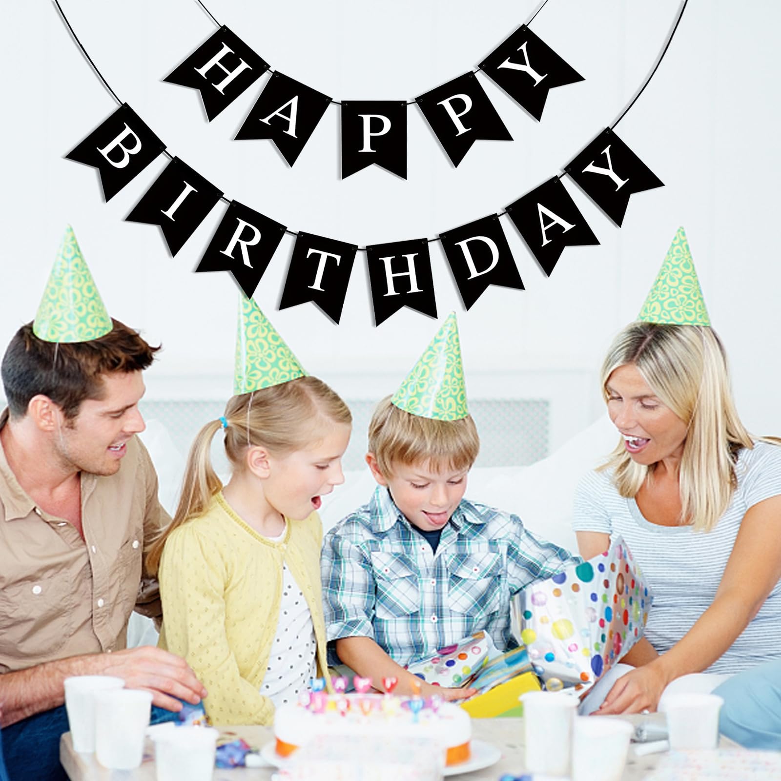 Imtively Happy Birthday banner above gift table for photo-worthy moments