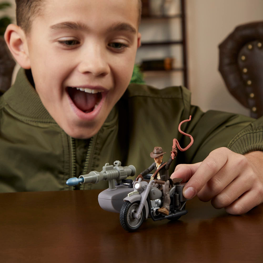 Repositionable projectile launcher adds interactive action during adventures