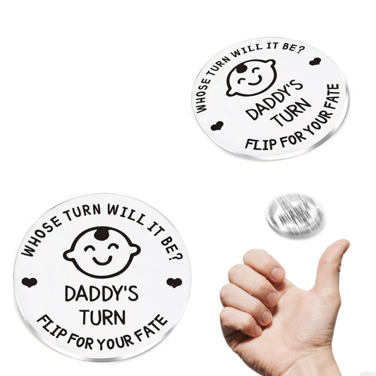 Infanote decision coin in hand for quick baby care decisions