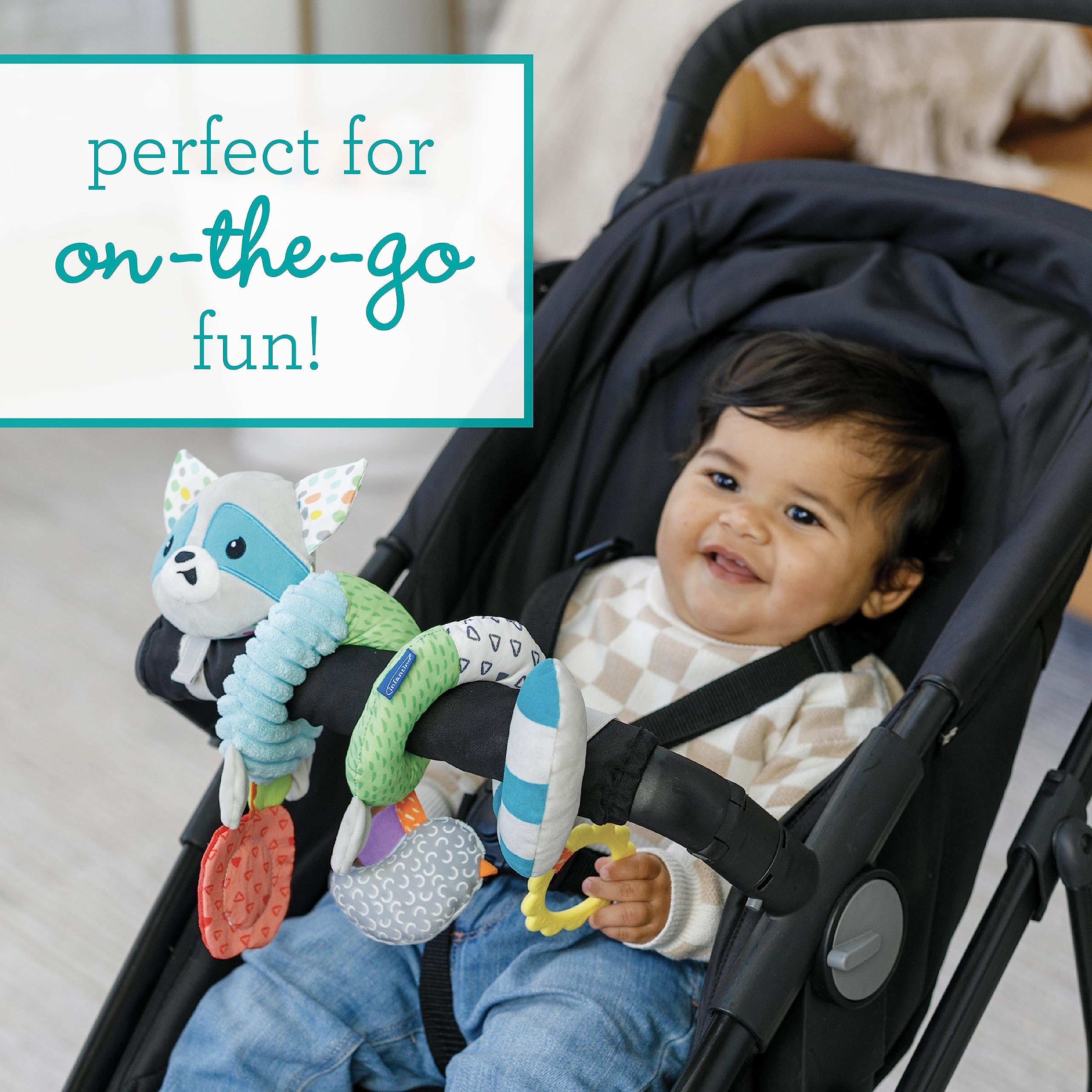 Infantino Spiral Toy selfie apple mirror invites peek-a-boo and visual exploration.