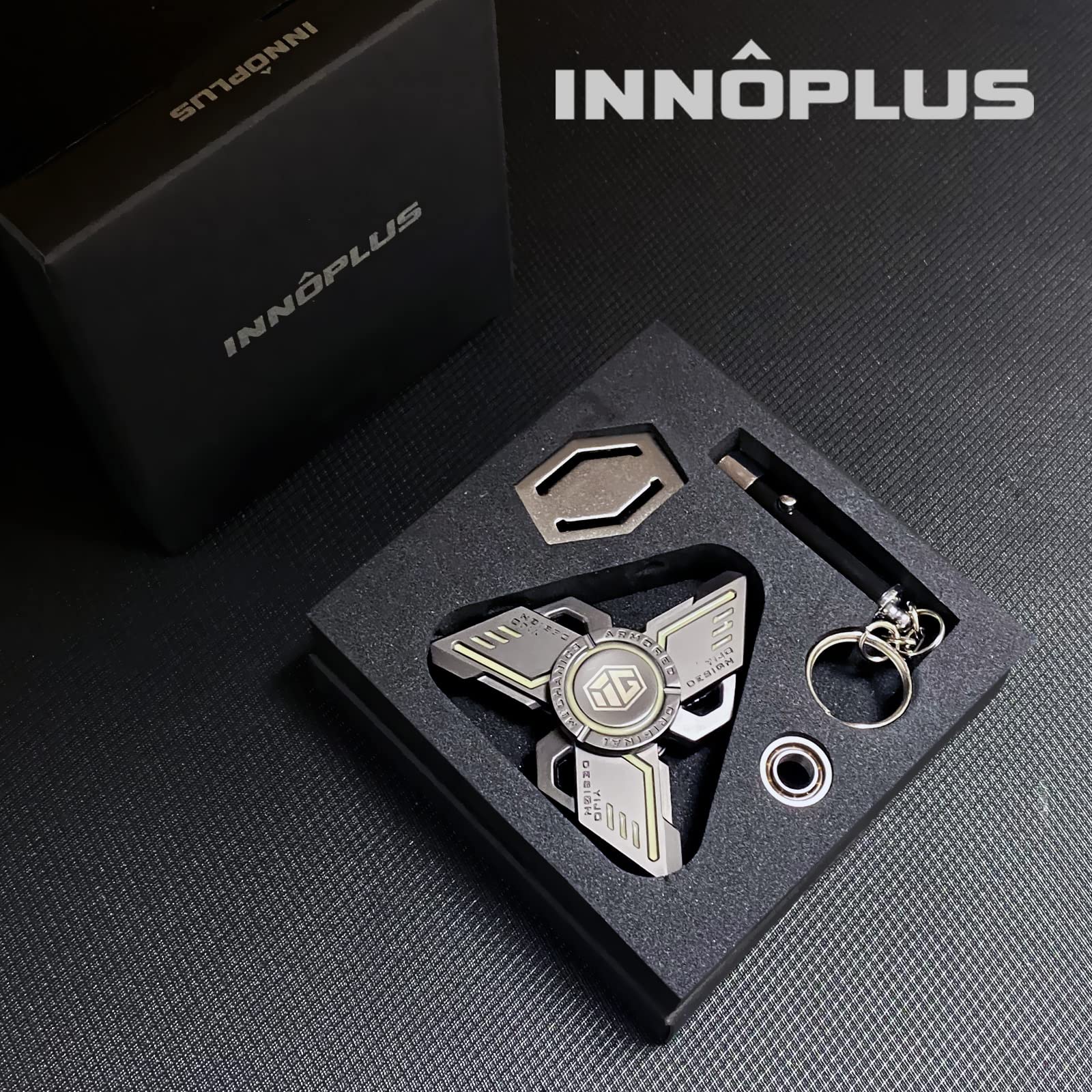 INNÔPLUS fidget spinner on a travel bag for on-the-go calm