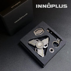 INNÔPLUS fidget spinner on a travel bag for on-the-go calm
