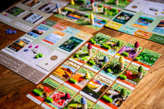 Inside Up Games Earth: Abundance events highlight shared resource generation for dynamic play.