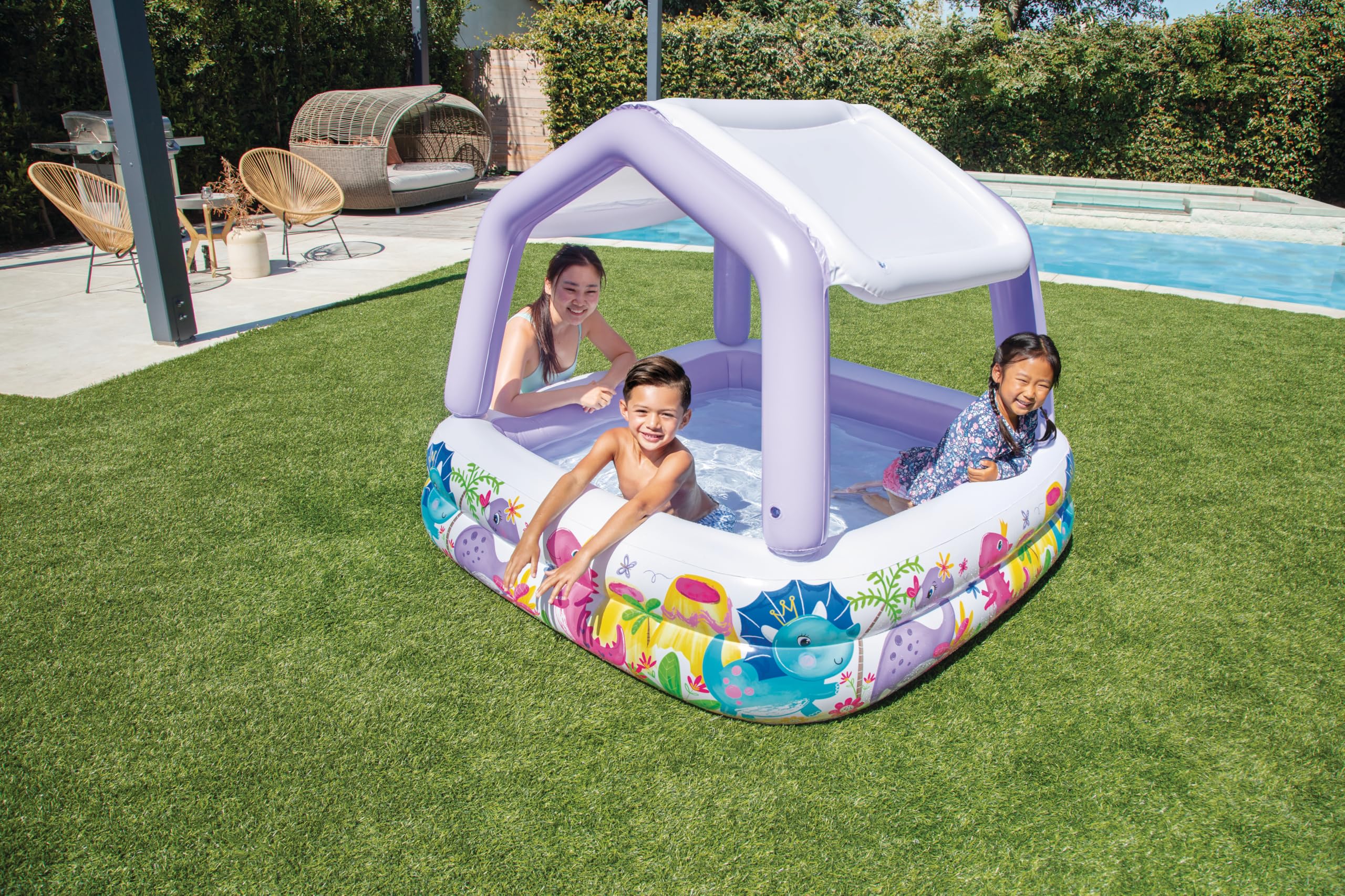 Intex kiddie pool 62x62x48 demonstrates compact size for small spaces.