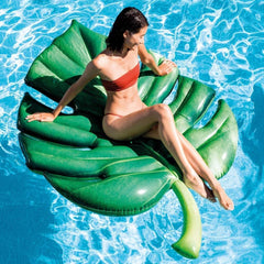 Intex palm leaf mat features two air chambers for stable lounging.