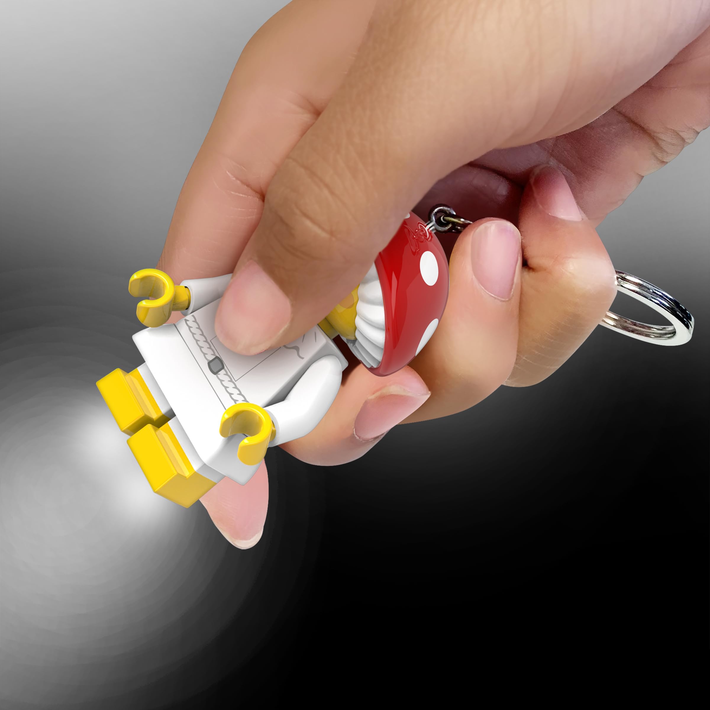 IQ LEGO Mushroom Sprite keychain light easily attaches to backpacks or purses via keyring.