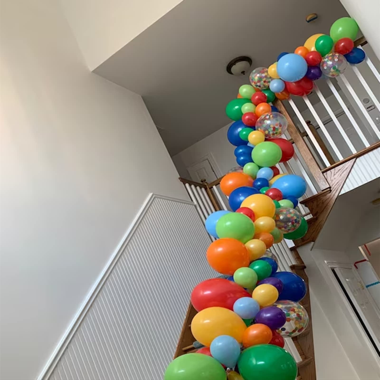 Isndare royal blue 12inch balloon creates vivid contrast in arches and garlands.
