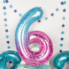 Isndare starry foil Number 6 balloon creates magical photo backdrop.