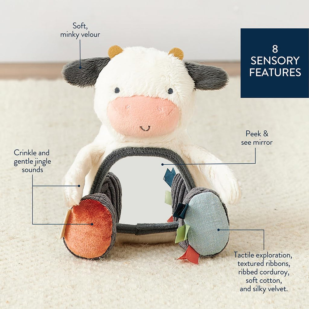 Itzy Ritzy cow feet and ribbons invite reaching and grasping