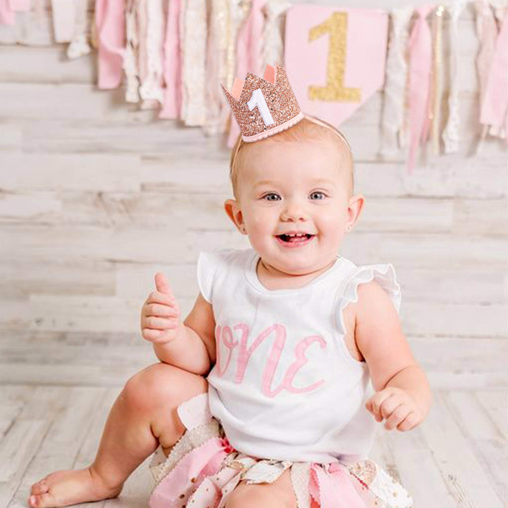 IVYRISE glitter birthday crown pink-gold on head, perfect photo prop for cake smash