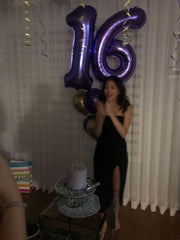 IWERP 14th birthday purple foil balloon enhances party decor for photos.