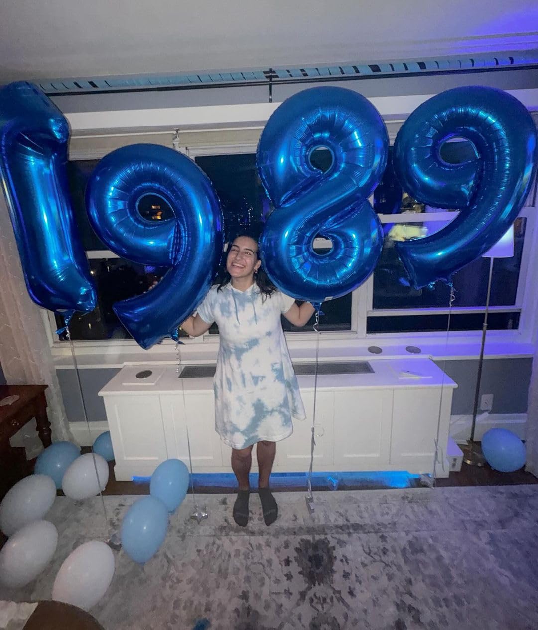 IWERP 19th blue foil balloon adds festive flair to cake table.