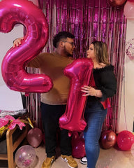 IWERP 21st birthday foil balloon in hot pink elevates party backdrop.