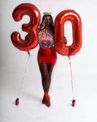 IWERP 40-inch red number balloon on stage creates a vibrant photo backdrop