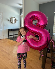 IWERP 40-inch number balloon serves as a striking birthday photo backdrop