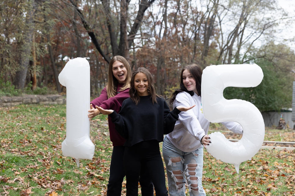 IWERP 40-inch number balloon adds focal point for fifth birthday celebrations.
