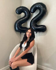 IWERP Black 9th birthday balloon highlights elegant ambiance and photo-worthy decor.